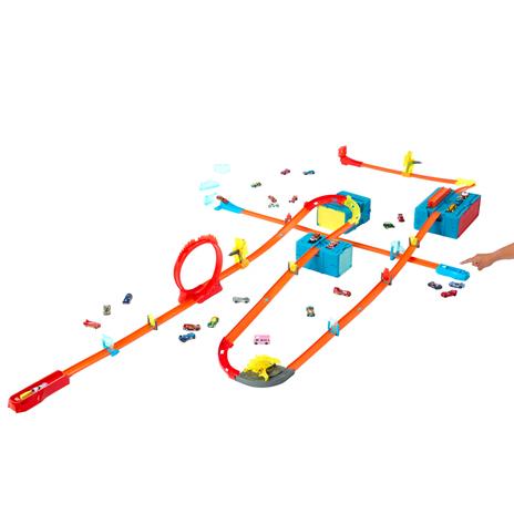 Hot Wheels - Track Builder Set da costruzione con pezzi di pista, include 1 macchinina e accessori in un box impilabile