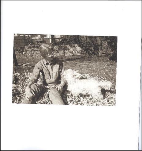 I hear the leaves and love the light. Sally in the Back Yard - Robert Adams - 2