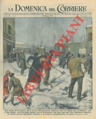 In un paese bloccato dalla neve, il sindaco (che é una donna) scende in strada e comincia a spalare la neve - copertina