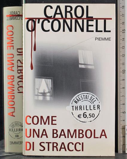 Come bambola di stracci - Carol O'Connell - copertina