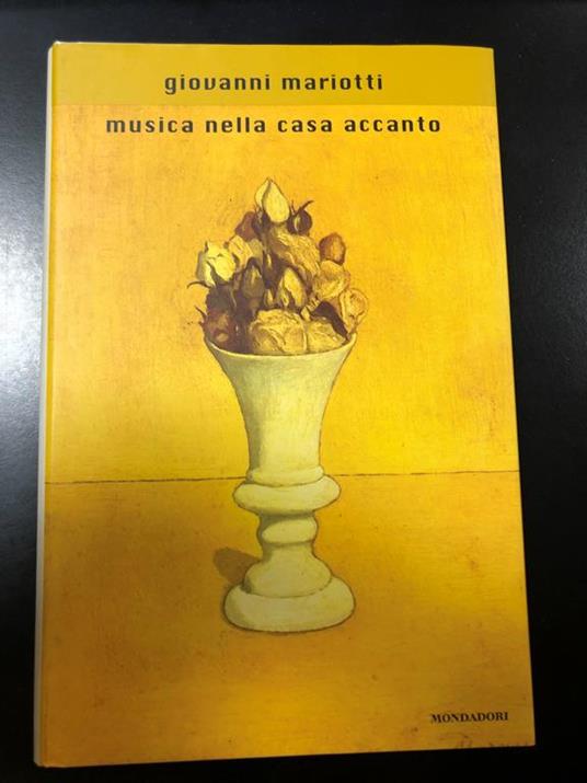 Musica nella casa accanto. Mondadori 1999 - I. Con dedica dell'autore - Giovanni Mariotti - copertina