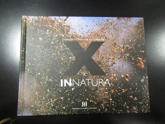 X Biennale internazionale di fotografia. Innatura. Fondazione Italiana per la Fotografia 2003 - copertina