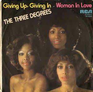 Giving Up, Giving In / Woman In Love - Vinile 7'' di Three Degrees