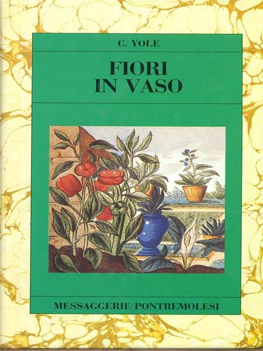 Un vaso di fiori e libri su un pavimento di legno con un libro intitolato  fiori.