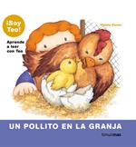 Un pollito en la granja