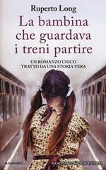 La bambina che guardava i treni partire