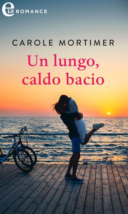 Un lungo, caldo bacio - Carole Mortimer - ebook